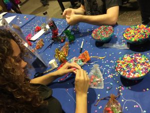 Making Pride Day bracelets