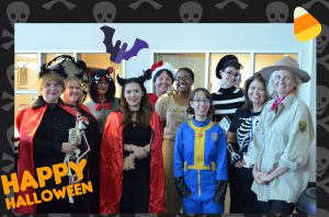 Librarian and staff dressed in costumes