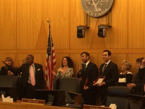 CSN Director of Communication and Government Affairs Micheal Flores, speaking, was honored by Clark County Commissioner Lawrence Weekly. Flores joined other local Hispanic leaders, including Jacki Ramirez, to his right, and State Senator Ruben Kihuen, to his left.